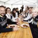 26 February: Crown Prince Haakon and Crown Princess Mette-Marit visit the volunteers in Midtstuen. The Crown Prince also attended Nordic combined and the 15 km cross country for women, before they both attended the ski jumping, normal hill (Photo: Lise Åserud / Scanpix)